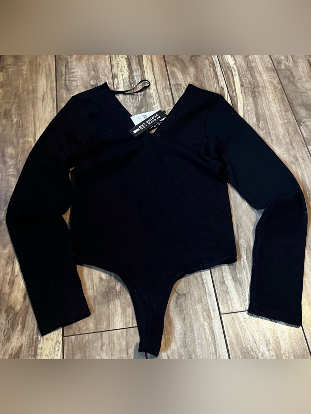 Design Lab Lord & Taylor black long sleeve ribbed v-neck thong bodysuit.